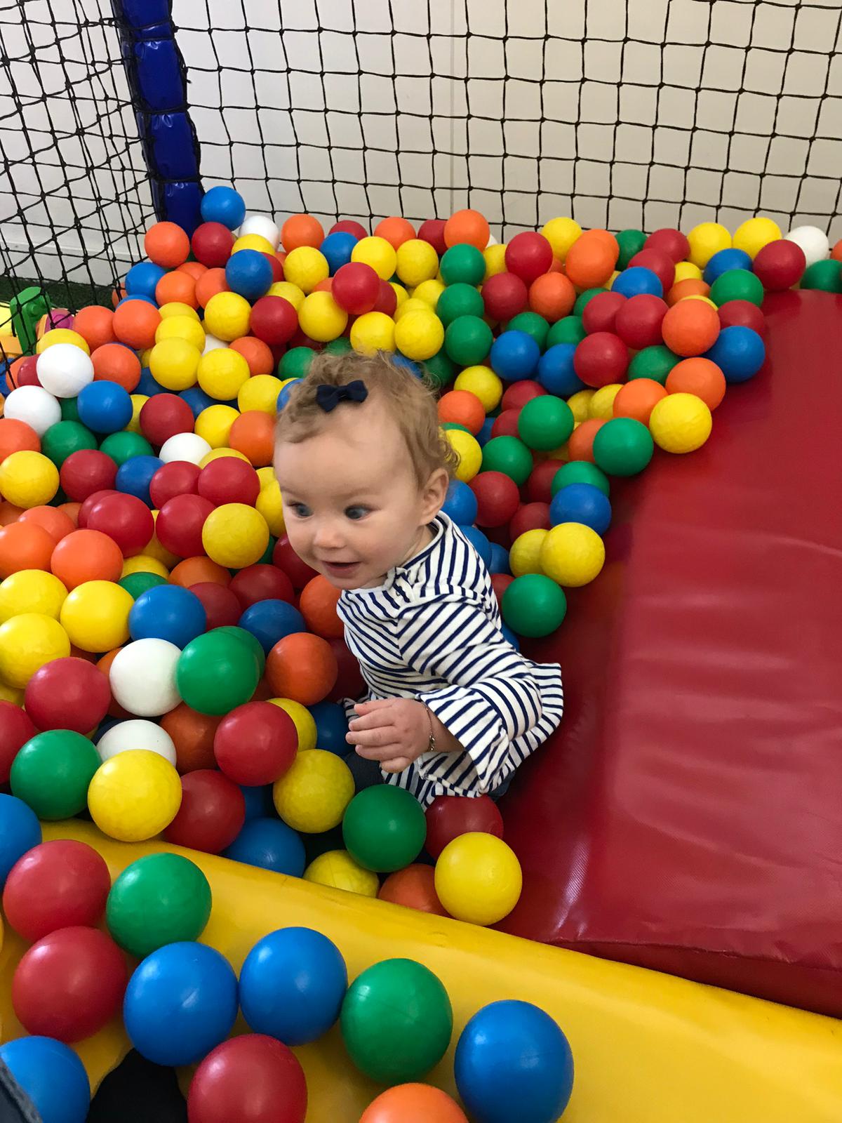 playing child in toddler play area