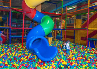 tube slide that opens into a ball pit